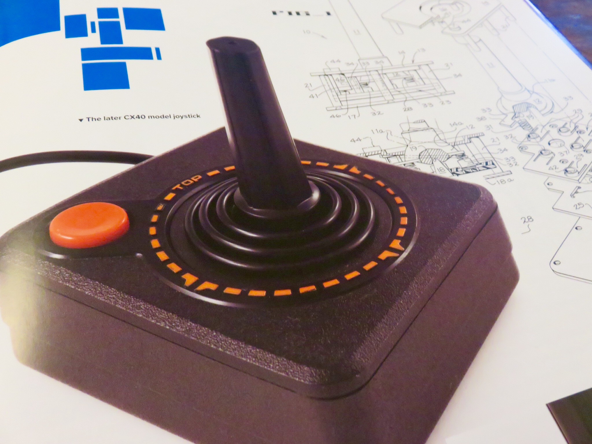 Original one-button Atari joystick with circuitry schematic. © The Art of Atari