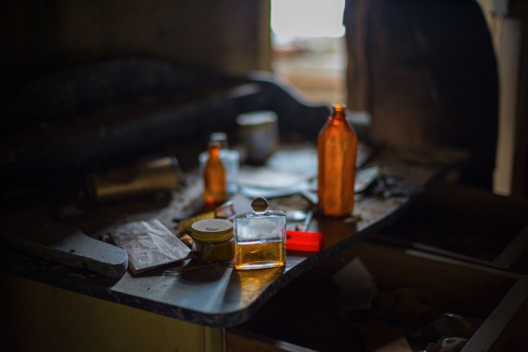 Bottles and table, Villa Schade